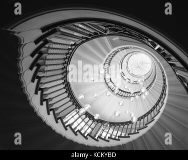 Black and white / monochrome image of Cecil Brewer's spiral staircase in Heals Department Store, Tottenham Court Road, London UK Stock Photo