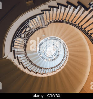 Colour image of Cecil Brewer's spiral staircase in Heals Department Store, Tottenham Court Road, London UK Stock Photo