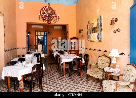 Room displaying beautiful antique furniture  in the Museo Romantico, Plaza Mayor, Trinidad, Cuba,Caribbean Stock Photo