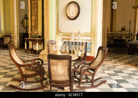 Room displaying beautiful antique furniture  in the Museo Romantico, Plaza Mayor, Trinidad, Cuba,Caribbean Stock Photo