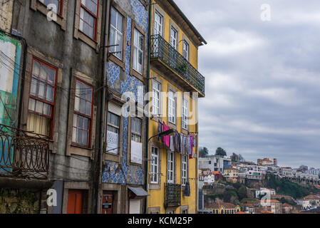 Old residential building with Azulejo facades in Ribeira District of Porto city, Portugal Stock Photo