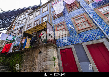 Old residential building with Azulejo facades in Ribeira District of Porto city, Portugal Stock Photo