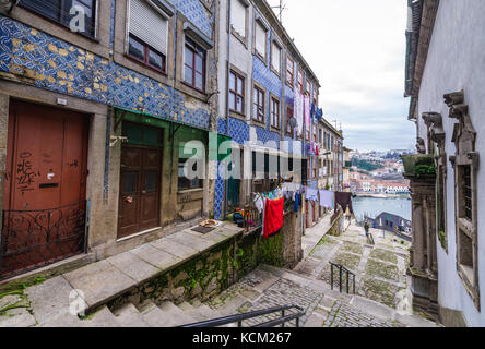 Old residential building with Azulejo facades in Ribeira District of Porto city, Portugal Stock Photo