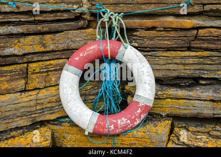 Lifebuoy ring at Castletown harbour, Caithness, Scotland, UK Stock Photo