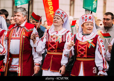 Gomel, Belarus - May 9, 2015: People in national Belarusian folk costume participating in the parade dedicated to the Victory Day - the 70th anniversa Stock Photo