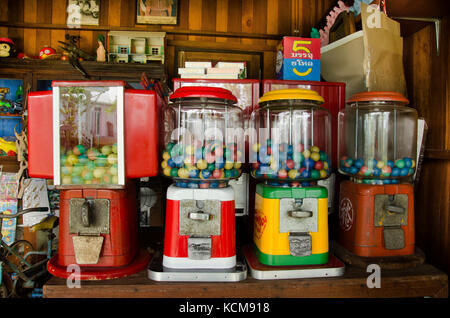 Antique Gumball Machine - Capsule Toy thai style for people and travelers playing at retro shop on June 8, 2017 in Nonthaburi, Thailand