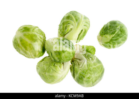 a pile of Brussels sprouts on white background Stock Photo