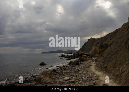 landscape of a famous rock formations, bays near the extinct volcano Karadag Mountain in KaraDag reserve in north-east Crimea, Black sea Stock Photo