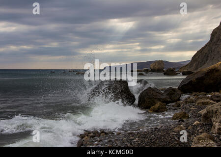 landscape of a famous rock formations, bays near the extinct volcano Karadag Mountain in KaraDag reserve in north-east Crimea, Black sea Stock Photo