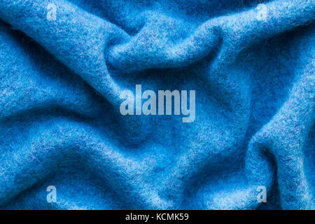 Close Up Of Blue Crumpled Woolen Cloth. Top View. Woolen Cloth. Stock Photo