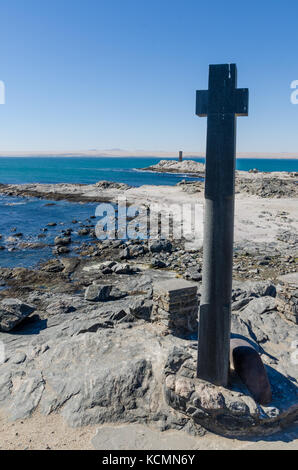 Diaz Point with stone cross on the Luderitz Peninsula in the Namib desert, Namibia, Southern Africa Stock Photo