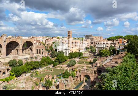 Rome, Forum. View from the Palatine Hill over the ancient ruins of the Roman Forum (Foro Romano) towards the Colosseum (Coliseum), Rome, Italy Stock Photo
