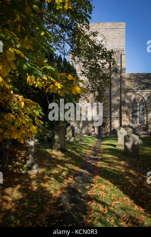 The church of St Mary's in the Northumbrian village of Blanchland, on 29th September 2017, in Blanchland, Northumberland, England. St. Marys is on the site of the former Abbey and the village got its name from the white habits worn by monks of the Premonstratensian order who founded Blanchland Abbey. Built in the 13th century, the abbey survived until the 16th century when it fell into ruin. Parts of the Abbey survive including St. Mary's Church, which was rebuilt in 1751-52. Blanchland is a village in Northumberland, England, on the County Durham boundary. It is a conservation village, largel Stock Photo