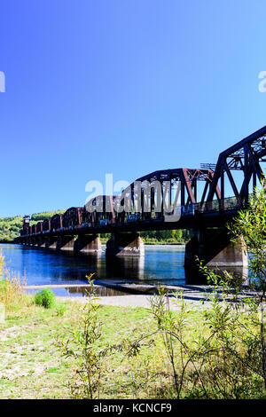 A rail bridge over the Fraser River in Prince George, British Columbia Stock Photo