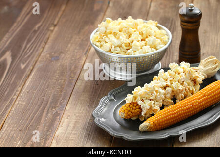making popcorn from a cob by microwave Stock Photo