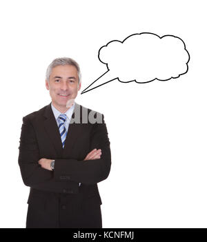 Portrait Of Mature Businessman Isolated Over White Background Stock Photo