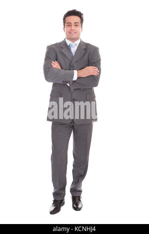 Portrait Of Young Businessman With Hands In Pocket Stock Photo