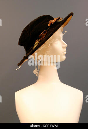 Brown Velvet Hat with Multicolored Velvet Flowers Stock Photo