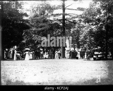 This photograph from 1913 captures a crowd at the Miami University commencement. The image reflects the academic traditions of the time and offers a view of the students and faculty participating in the ceremony. Stock Photo