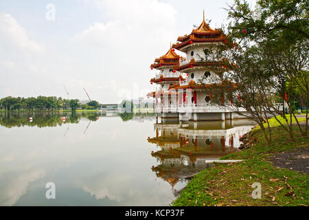 Two pagodas on lake in the Chinese garden, Singapore Stock Photo