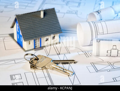 House and two keys on construction plans Stock Photo