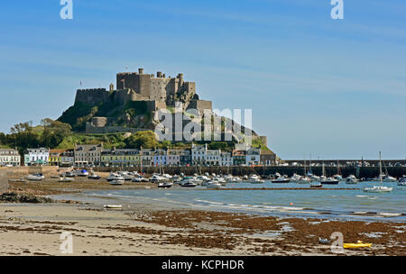 Mont Orgueil - Gorey - Jersey Channel Isles - ancient castle overlooking Gorey harbour - sunlight and shadows - incoming tide Stock Photo