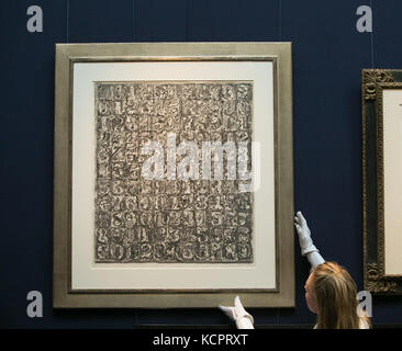 London, UK. 6th Oct, 2017. A Sotheby's staff hangs Numbers by Jasper Johns (2006) Sotheby's in central London unveils forthcoming sales of contemporary, impressionist & modern art by Monet, Cèzanne, Miró, Magritte, Picasso, Basquiat, Dubuffet & Lichtenstein Credit: Dinendra Haria/Alamy Live News Stock Photo