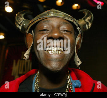 Los Angeles, California, USA. 17th Dec, 2004. Rapper FLAVOR FLAV arrives at the 9th Annual Prism Awards Gala at the Henry Fonda Theater. William Jonathan Drayton Jr., better known by his stage name Flavor Flav, is an American musician, rapper, actor, television personality, and comedian who rose to prominence as a member of the hip-hop group Public Enemy. Born: March 16, 1959 (age 58), Roosevelt, NY, U.S. Credit: J.P. Yim/ZUMAPRESS.com/Alamy Live News Stock Photo