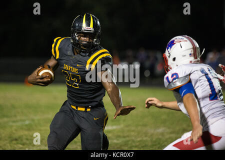 Florida, USA. 6th Oct, 2017. LOREN ELLIOTT | Times .Lakewood running back Cornell Battles looks to get past Pinellas Park linebacker Christian Syms during the first half of a game between Pinellas Park and Lakewood at Lakewood High in St. Petersburg, Fla., on Friday, Oct. 6, 2017. Credit: Loren Elliott/Tampa Bay Times/ZUMA Wire/Alamy Live News Stock Photo