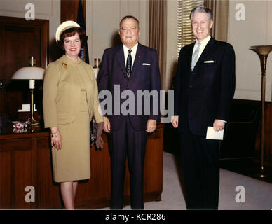 HANDOUT - Adelphi, MD - (FILE) -- On January 26, 1967, Assistant Director W. Mark Felt of the Inspection Division, right, accompanied by his wife, left, was photographed with Federal Bureau of Investigation (FBI) Director J. Edgar Hoover, center, following the presentation of his 25-Year Service Award Key at FBI Headquarters in Washington, DC Mr. Felt revealed in the July, 2005 issue of Vanity Fair magazine he is the source known as 'Deep Throat' that provided key information to the Washington Post during the Watergate scandal which resulted in the resignation of United States President Rich Stock Photo