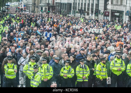 London, UK. 7th Oct, 2017. Thousands of supporters representing various English football clubs march through central London to Westminster in solidarity against extremism. The march has been organised by the FLA (Football Lads' Alliance), which was formed in the wake of the Manchester bombings and the London Bridge terror attack on June 3 Credit: amer ghazzal/Alamy Live News