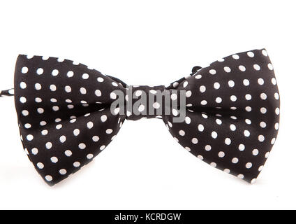 Elegant male black bow in white peas on a light white background. Stock Photo