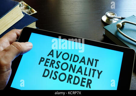Avoidant personality disorder written in a tablet. Stock Photo