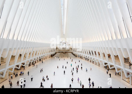 Oculus interior of the white World Trade Center station with people in New York. The station was designed Stock Photo