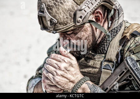 Army soldier smoking Stock Photo