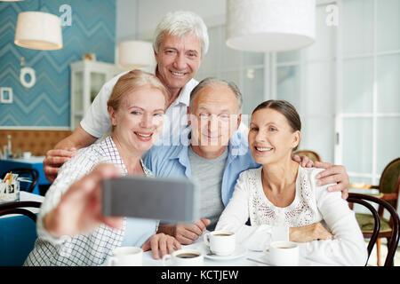 Taking Selfie with Friends Stock Photo