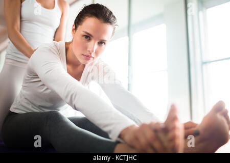 Pretty Woman Wrapped up in Training Stock Photo