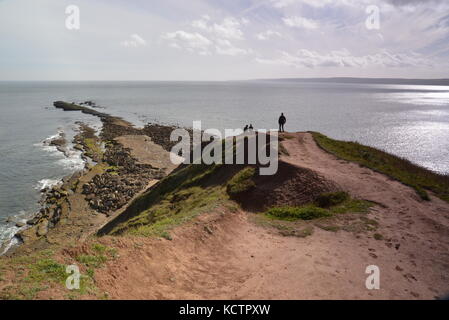 A walk on a sunny autumn day along the coastal path at Filey, North Yorkshire UK Stock Photo