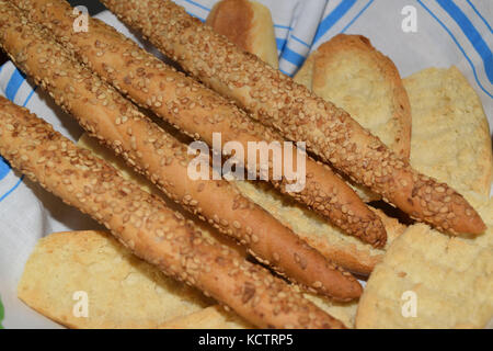 basket with bread and grissini with sesame Stock Photo