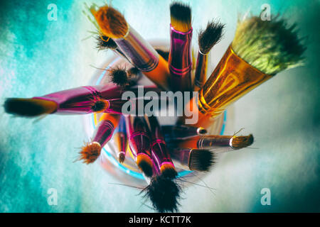 Paint brushes in jar. Top view. Stock Photo