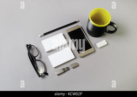 Set of blank stationery elements on gray background. Branding template. Photo of blank stationery. Mock-up for your design. Stock Photo