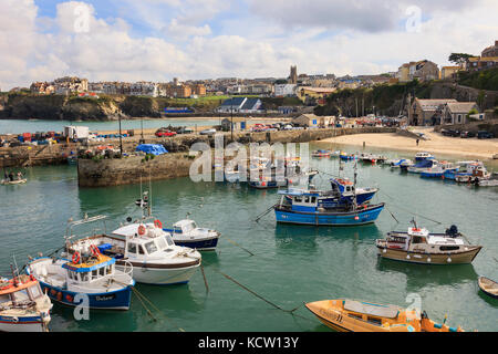 View to the Cornish town with fishing boats moored in the harbour. Newquay, Cornwall, England, UK, Great Britain Stock Photo