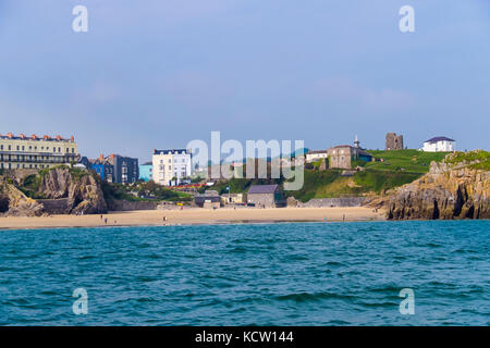 Offshore view across sea water to Castle Beach in Pembrokeshire Coast National Park resort. Tenby, Carmarthen Bay, Pembrokeshire, Wales, UK, Britain Stock Photo