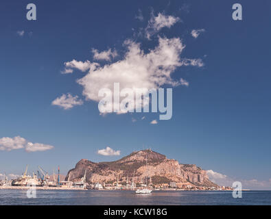 Palermo, Sicily, Italy, July 15 / 2017 Pilgrim Mountain of Palermo, sea, sailboat and port of Palermo, famous Pilgrim Mountain in the background Stock Photo