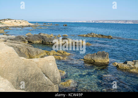 Rocky cove and blue Mediteranian sea on the Spanish island of Tabarca Stock Photo