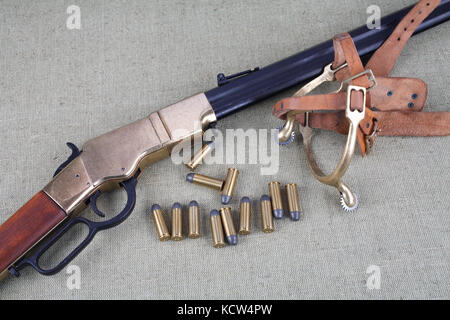 Wild west rifle and ammunition Stock Photo