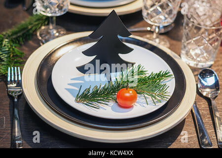 Beautifully decorated table for Christmas dinner Stock Photo