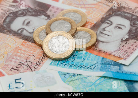 New UK currency, 10 pounds, 5 ponds, 1 pound coins Stock Photo