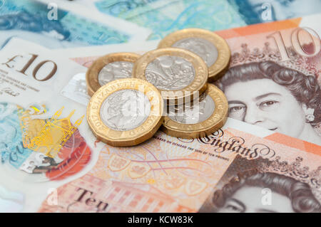 New UK currency, 10 pounds, 5 ponds, 1 pound coins Stock Photo