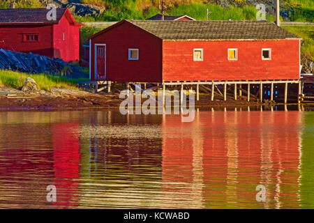 Reflection of village in  in Bonavista Bay, Salvage, Newfoundland & Labrador, Canada Stock Photo